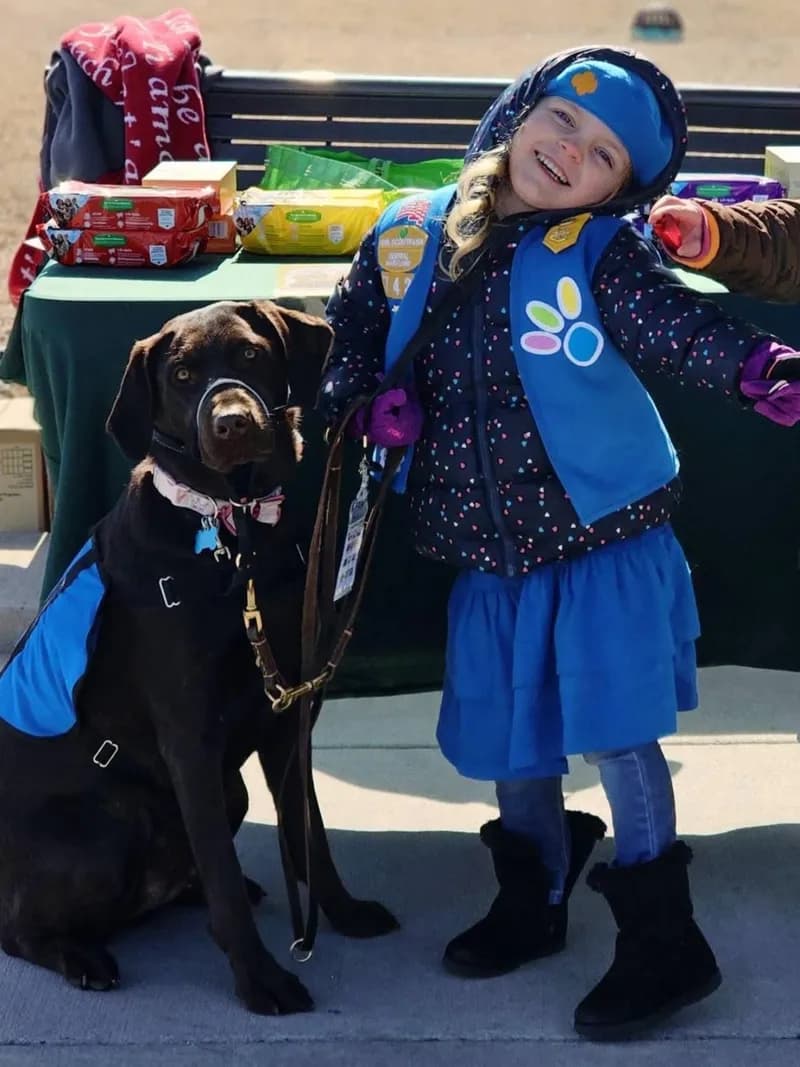 Lila with Gracey, her service dog